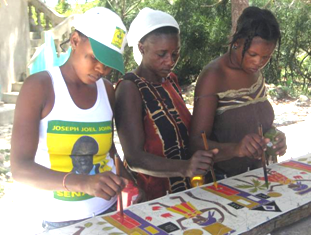 Haitian Artists working on a Scarf, Photograph by Ellen LeBow