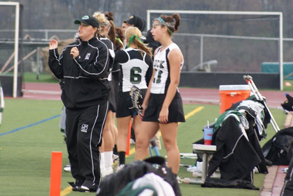 Coach Emily Boosahda Hopkins cheers on her Slippery Rock University’s Women’s Lacrosse Team. Photograph by Stephanie Boosahda.